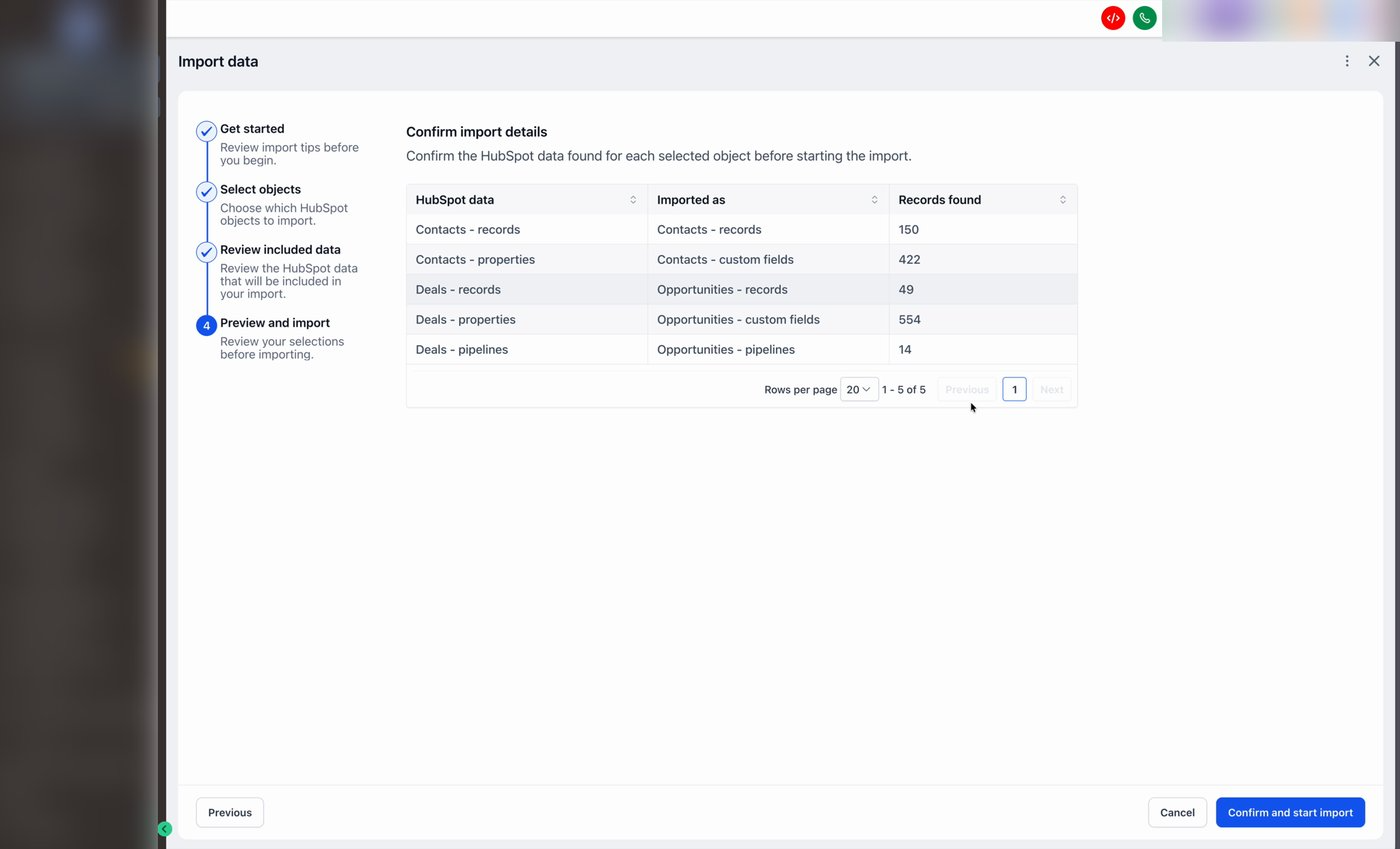 The Preview and import step showing a Confirm import details table with HubSpot data, Imported as, and Records found counts.